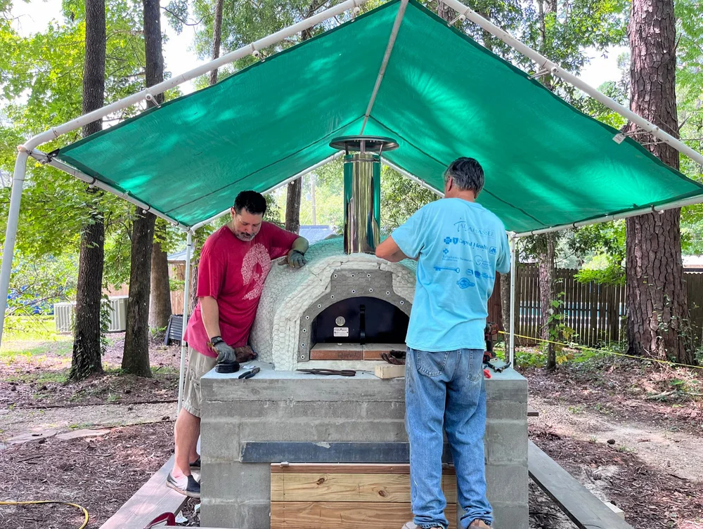The community oven being built