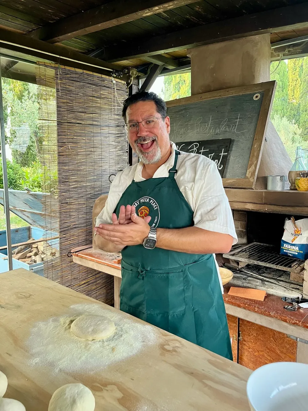 Dave making pizza in Tuscany